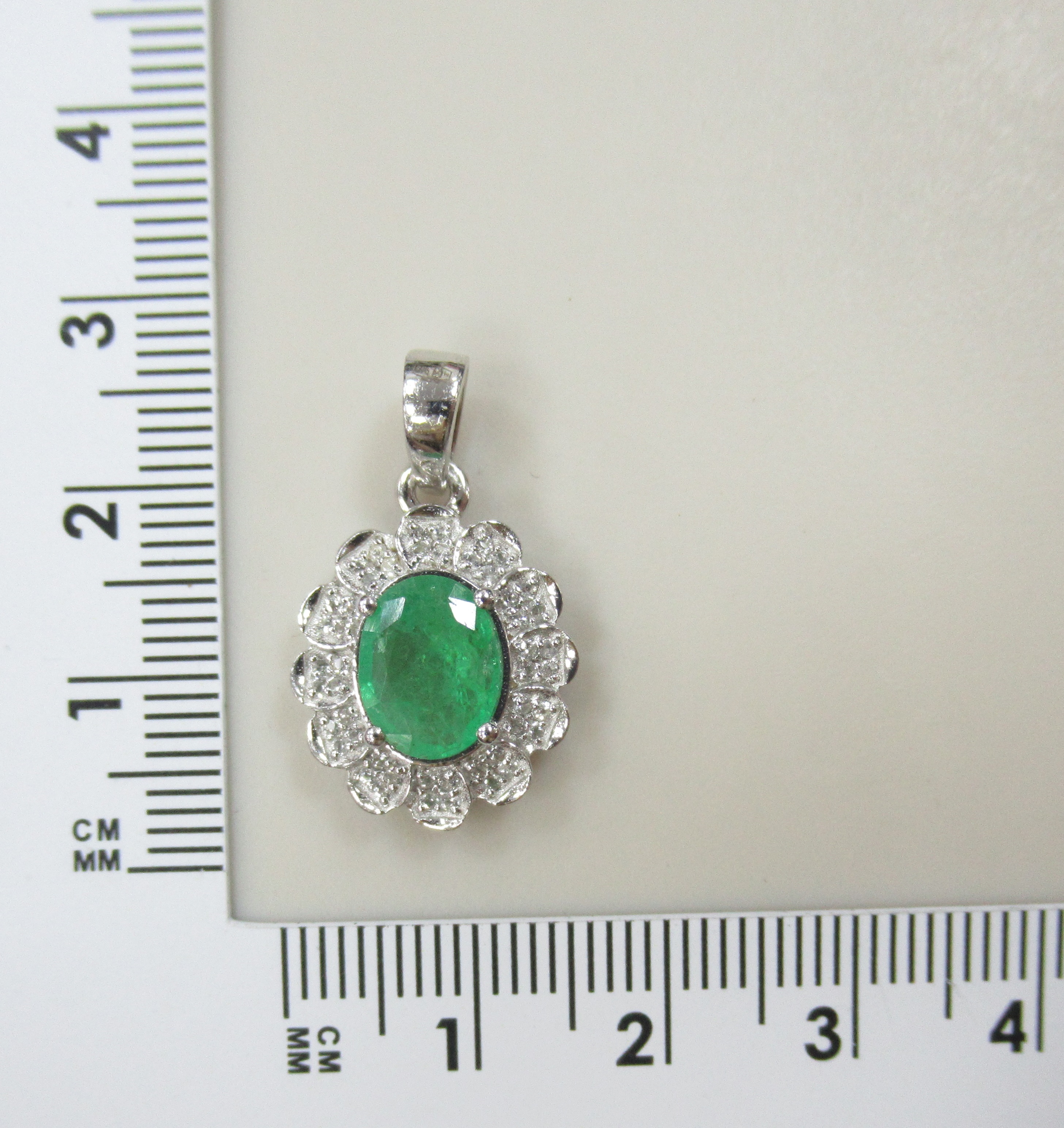 Серебряная подвеска с изумрудом "Цветок"